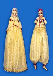 Snake Charmer and the belle (Puppets in cream)